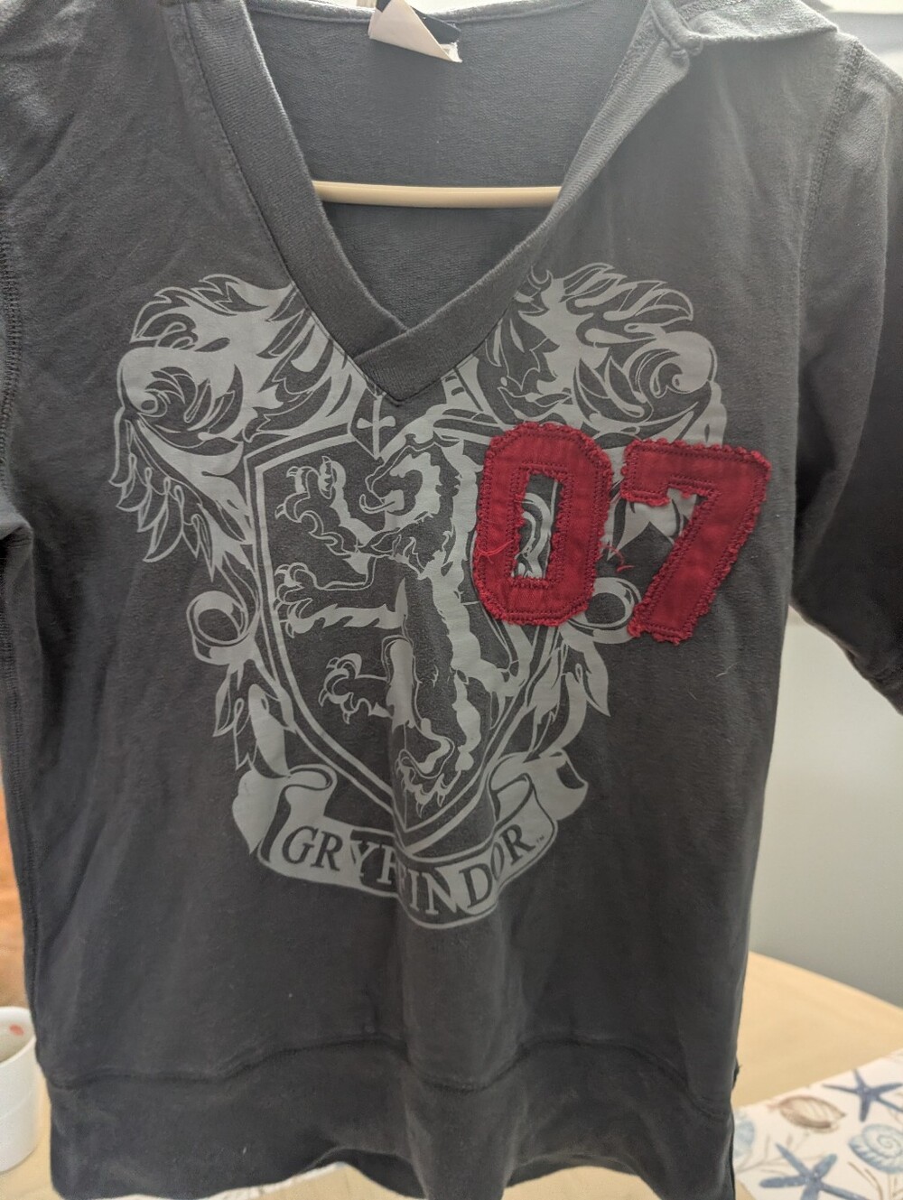 Harry Potter Gryffindor Hooded V-Neck Tee in Charcoal with Red '07 Patch